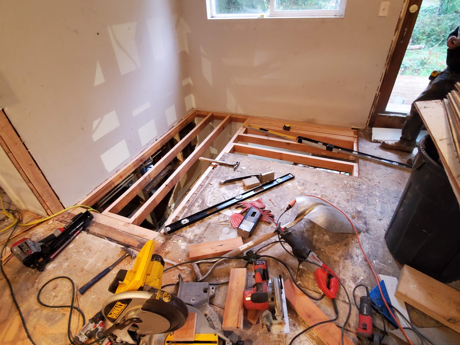 Kitchen during demolition, walls opened to the studs