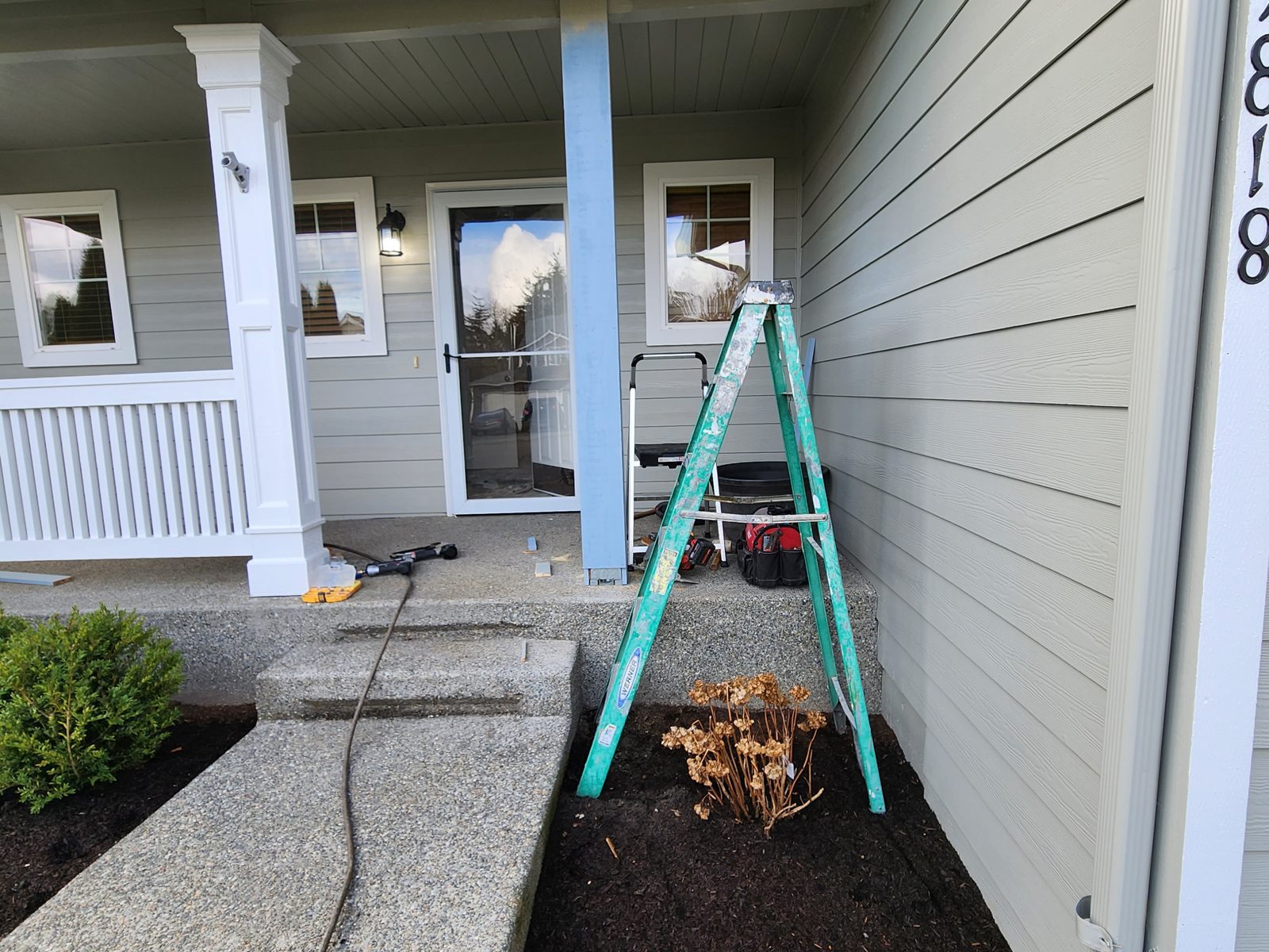 Front porch during column and railing construction